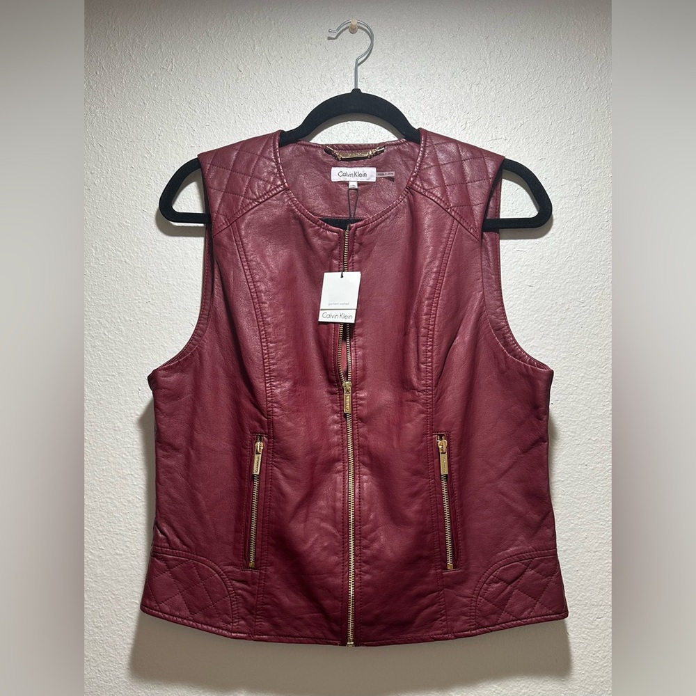 Calvin Klein faux leather vest in burgundy, women’s size medium.